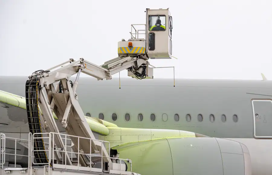Image showing plane being de-iced